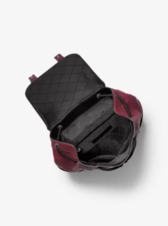 コルビー ミディアム ロゴエンボス加工 バーニッシュドレザー バックパック